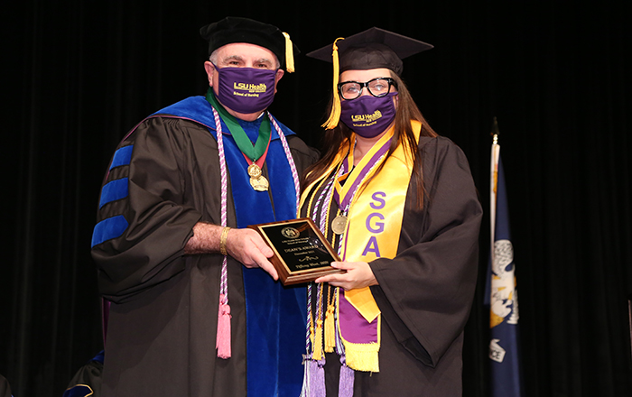 Dr. Demestius Porche and Tiffany West at graduation